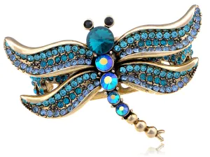 Electrifying Blue Zircon Dragonfly Over A Gold Cuff Bracelet